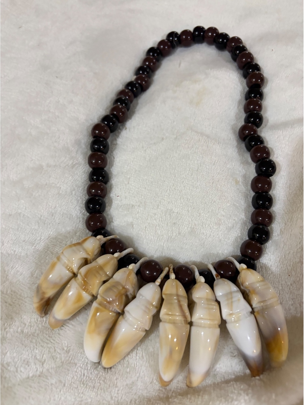 Amscan brand Witch Doctor necklace brown with elephant tusks